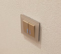 Выключатель двухклавишный проходной с подсветкой (шампань рифленый) (W1122110)