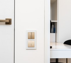 Выключатель двухклавишный с подсветкой (шампань рифленый) (W1120110)